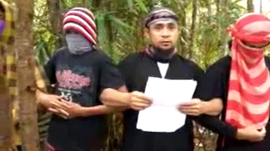 Abu Sayyaf pledging allegiance to the Islamic State