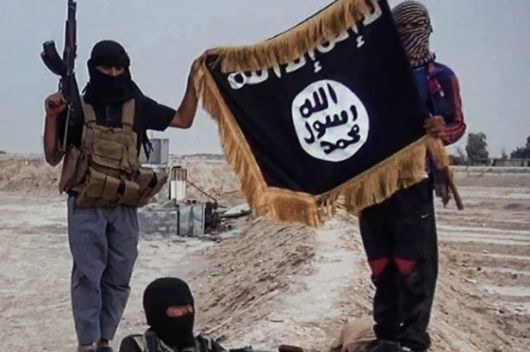 Militants-of-the-Islamic-State-of-Iraq-and-the-Levant-ISIL-posing-with-the-trademark-Jihadists-flag